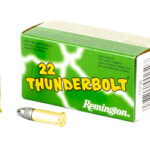 Box of Remington .22 Thunderbolt ammunition with two bullets beside it.