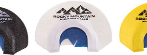 Three Rocky Mountain Hunting Gear caps in black, white, and yellow, shown side by side with a blue inner lining and mountain logo on each cap.