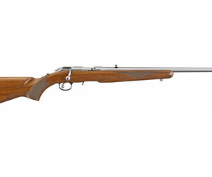Bolt-action rifle with a wooden stock and long metal barrel shown in profile.