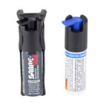 Two practice inhalers for inhaler technique training: a black inhaler with gray mouthpiece and a white inhaler with a blue cap.