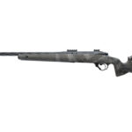 Bolt-action hunting rifle with long barrel, camouflage stock, and scope mounts, shown isolated on white.]