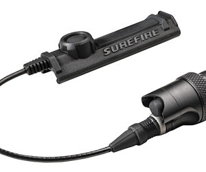 SureFire remote pressure switch with a coiled cord attached to a tactical flashlight head.