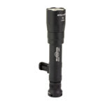 Black compact tactical flashlight with a side-mounted bracket, standing upright on a round base.