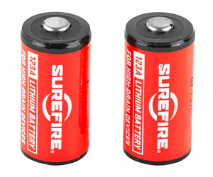 Two red SureFire lithium primary batteries standing upright side by side.