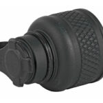 Black bicycle tire valve adapter with a knurled cylindrical body and a clamping lever on the end.