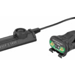 SureFire tactical flashlight with remote pressure-switch and mounting adapter connected by a cord