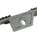 Gray rifle rail mount with Picatinny rails on both sides and a central mounting hole, labeled Springfield Armory.