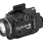 Compact weapon-mounted light with integrated accessory (model TLR-8G Sub) on a rail mount.