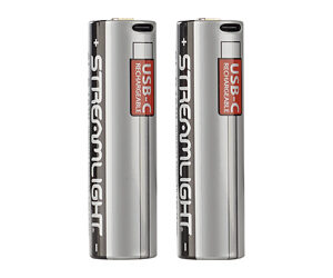 Two silver Streamlight USB flash drives standing side by side, showing cylindrical metal bodies with black branding and red USB labels.