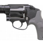 Side view of a compact revolver pistol with a black metal frame and gray textured grip