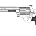 Side view of a silver revolver with a long barrel and black textured grip.