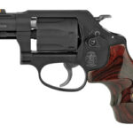 Smith & Wesson revolver with a wooden grip, shown in side profile.