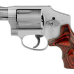 Profile view of a silver revolver with a polished metal frame and dark wooden grip against a white background.