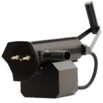 Handheld industrial tool with a black, vented body, a cylindrical nozzle, and an ergonomic rear handle attached to a short power cable.