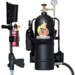 Full view of a Throw Flame flamethrower with black propane canister, hose, and handheld grip on a stand-equipped rig.