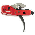 Red handheld tool with a curved black lever and metal blade, isolated on a white background, viewed from the side.