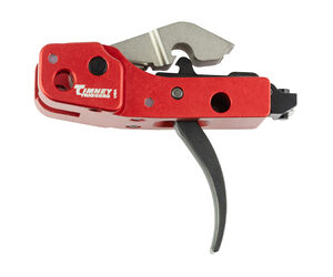 Red handheld tool with a curved black lever and metal blade, isolated on a white background, viewed from the side.