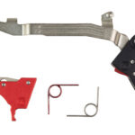 Disassembled bicycle front derailleur components laid out (outer/inner plates and link pieces) on white background