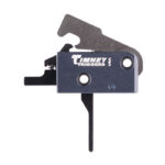 Small black metal trigger mechanism with a curved lever and mounting holes, labeled 'Tinney Triggers'.