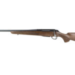 Bolt-action rifle with wooden stock and metal barrel shown in profile