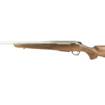Bolt-action rifle with wooden stock and long barrel, shown in profile on a white background.