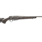 Bolt-action rifle with wooden stock and long blued barrel on a white background.