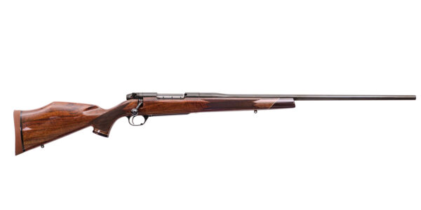 Side view of a bolt-action rifle with a polished wooden stock and long barrel.