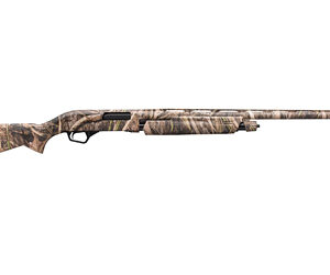 Camouflage-pattern hunting rifle with a long barrel and mounted scope