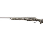 Camouflage-pattern bolt-action hunting rifle with a long barrel, shown from the side.