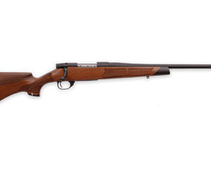 Bolt-action rifle with wooden stock and long barrel.