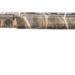 Camouflage-pattern hunting rifle with a long barrel and black butt pad, laid horizontally against a white background.
