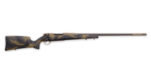 Bolt-action hunting rifle in brown and black camouflage with a long barrel and muzzle brake, laid horizontally.