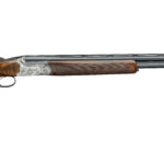 Side view of a double-barrel shotgun with a polished wooden stock and engraved metallic receiver.