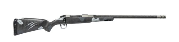 Bolt-action rifle with a gray-black camouflage carbon-fiber stock and a long barrel with a muzzle brake edge.