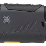 Compact SIG optical device with textured grip, shown in side profile.
