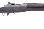 Bolt-action rifle with a long barrel and black stock shown in profile.