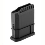 Black handgun magazine standing upright with ribbed feed lips at the top, black polymer body.