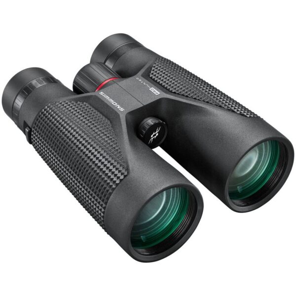 Compact black binoculars with textured grip and green-tinted lenses, angled for viewing outdoors.