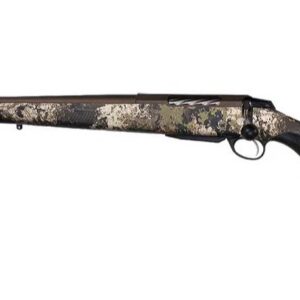 Bolt-action hunting rifle with a camouflage-pattern stock and long barrel, shown from side. It’s a scoped-looking rifle with a black butt pad and curved trigger guard.
