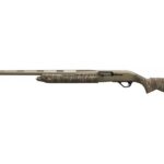 Camouflage-pattern hunting rifle with a long barrel and olive stock, shown in profile.